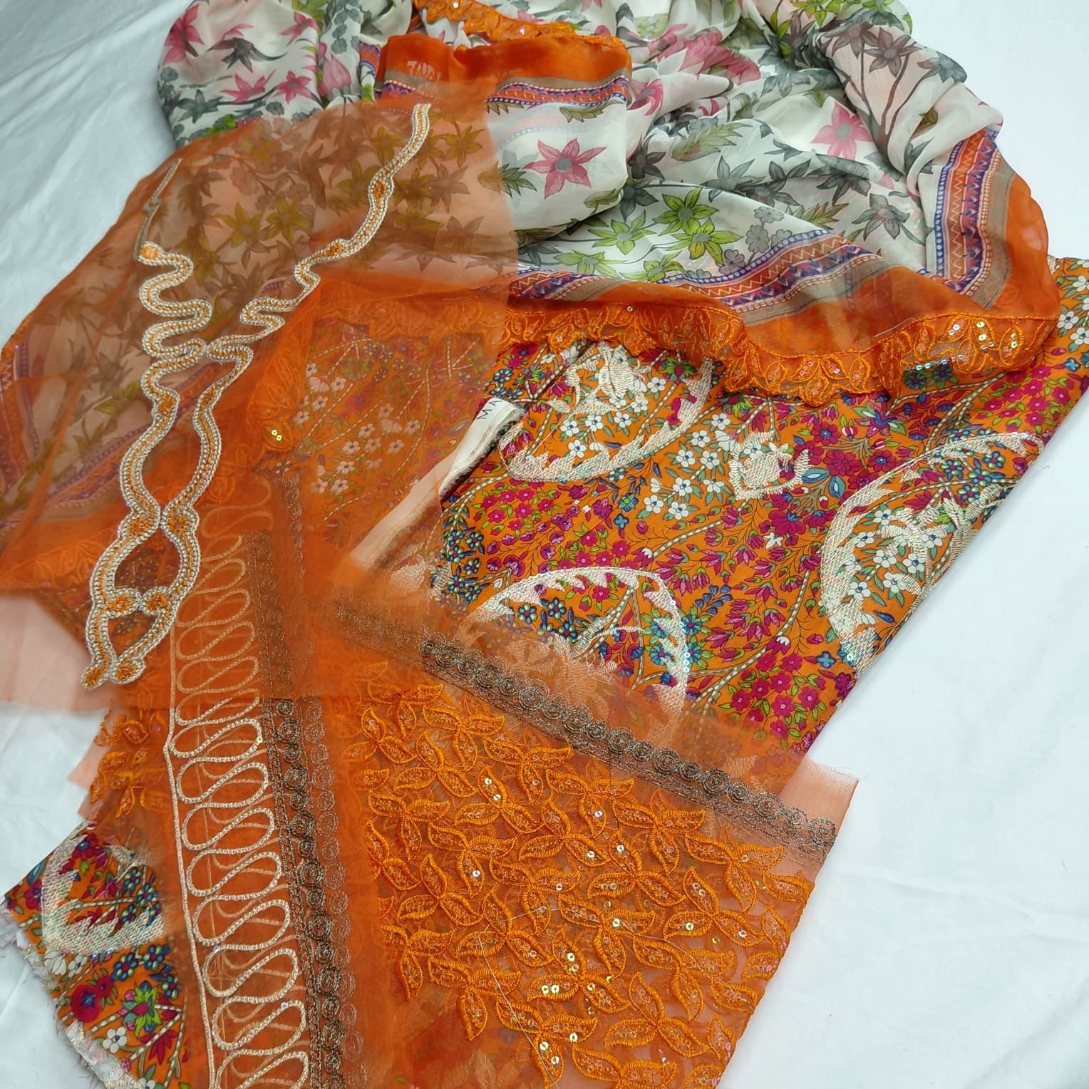 3pc M.b orange with multiflowers(print with embroidery)rs